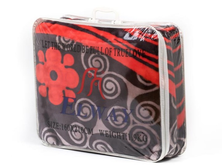 Opakowanie koca Elway w formie przezroczystej walizki zapinanej na zamek błyskawiczny.